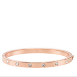 Set Stone Hinged Bangle in 18k Rose Gold Plating & Clear